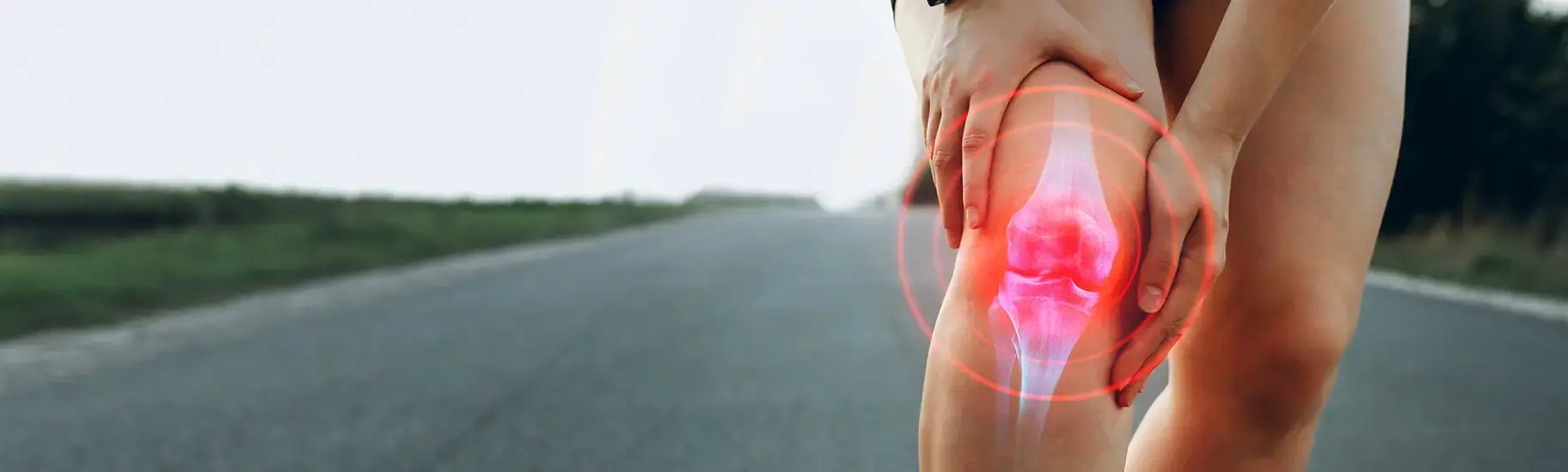 Knee joint highlighted in red, indicating pain. Expert care at Desert Spine and Sports Physicians, Arizona.