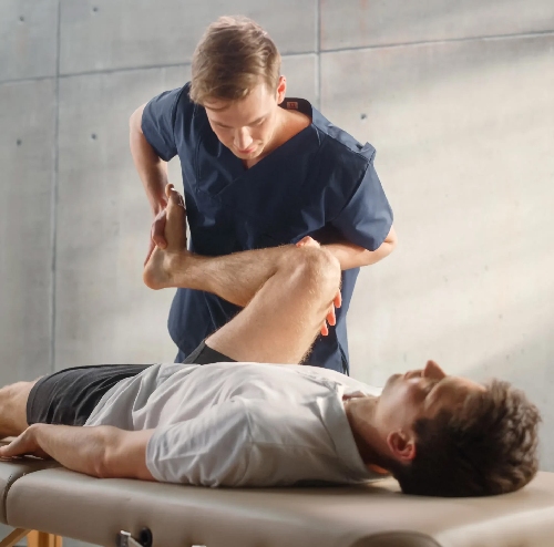 Physical therapist performs therapeutic leg assessment, enhancing mobility. Discover quality care and personalized treatment plans.