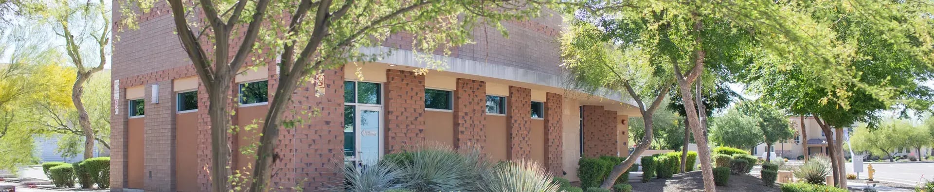 Exterior view of Desert Spine and Sports Physicians clinic in Arizona, specializing in spine and sports medicine treatments.