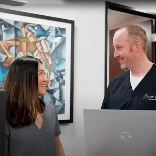 Friendly physician consult at Desert Spine and Sports Physicians, Arizona, enhancing patient care and spine health.