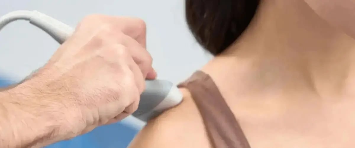 Ultrasound therapy on shoulder at Desert Spine and Sports Physicians, Arizona. Enhance healing with expert care.