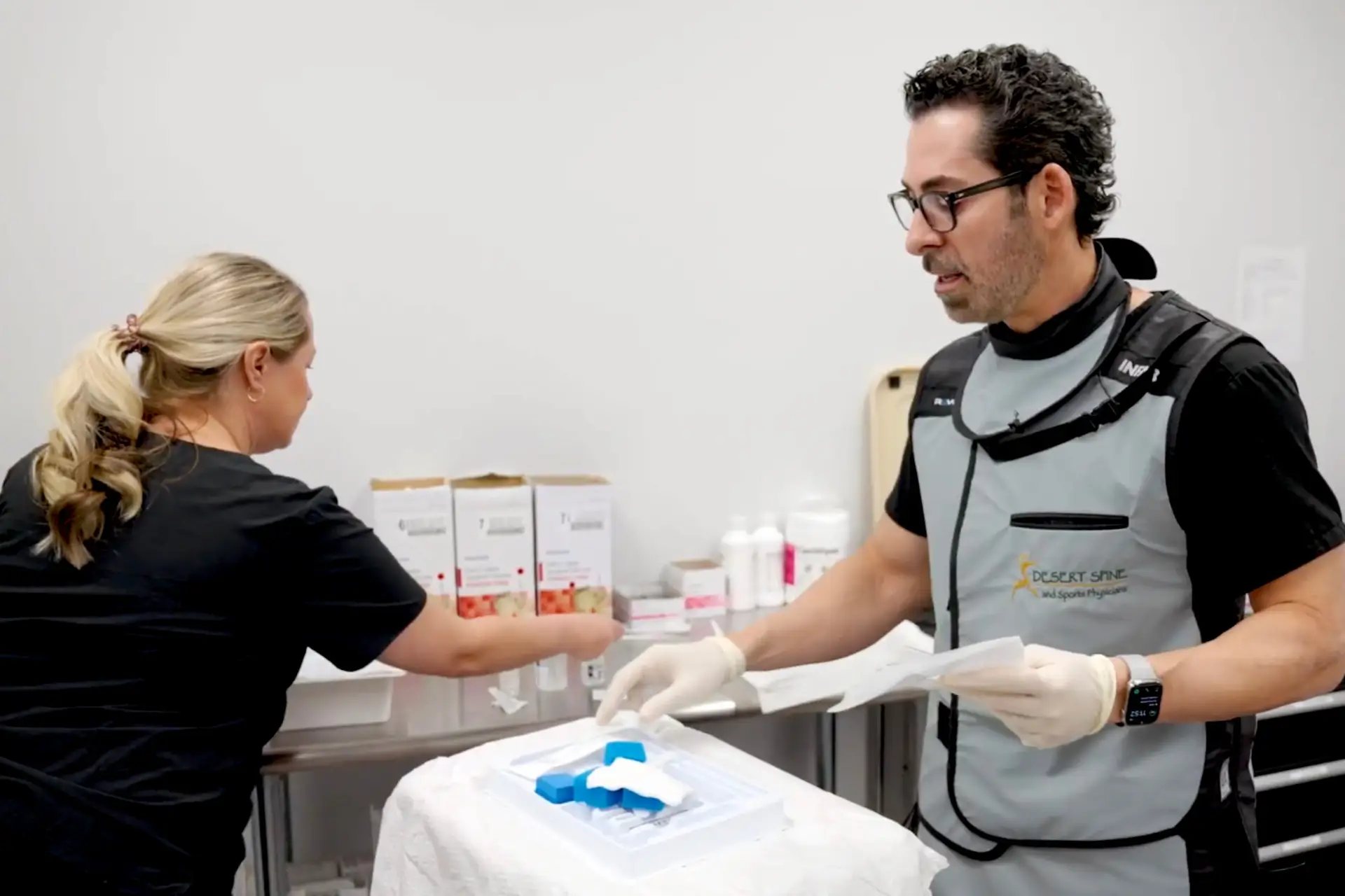 DSSP professionals prepare for a spine procedure, ensuring precision and patient safety in a sterile environment.